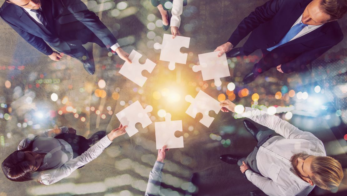 Business professionals reviewing digital procurement data and analytics dashboards to drive efficiency, cost control, and supplier performance improvements.